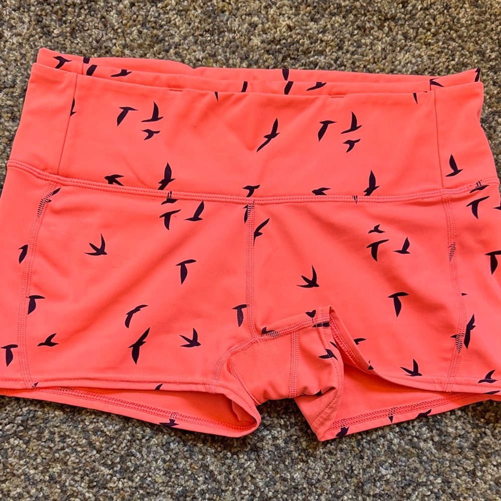 Oiselle Bright Pink Shorts with Black Bird Design